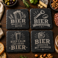 Set van vier vierkante leistenen onderzetters met biergravures